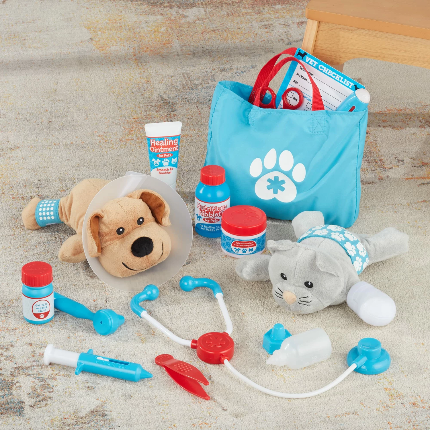 Melissa & Doug Examine & Treat Pet Vet Play Set - Image 7